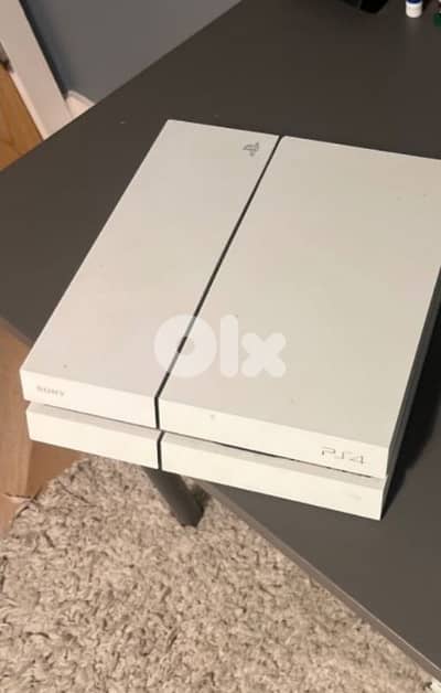 PS4 with Controller and 3 Games