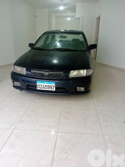 Mazda 323 1998 company source