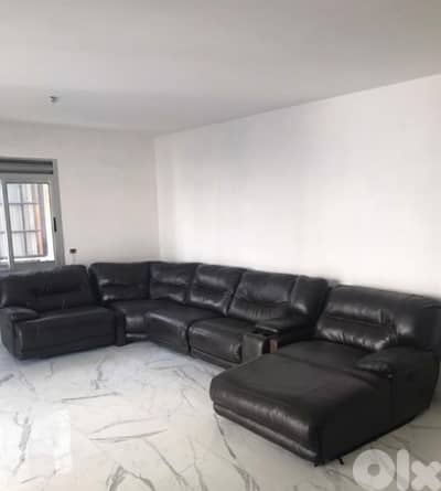 Dark brown leather recliner sofa