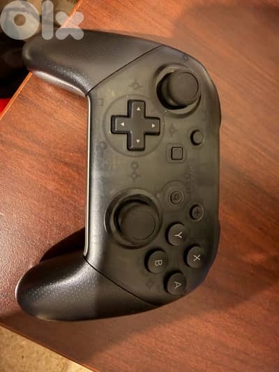 nintendo controller and joy con pair