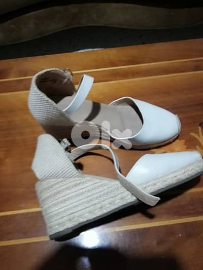 two secondhand shoes