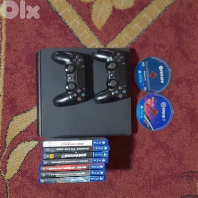 Ps4 slim 1TB & 9 cds 1 digital