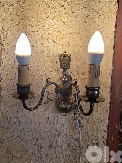 pair of bronze french wall lights