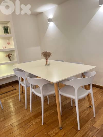 White set of tables and chairs