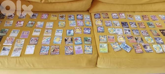 Pokemon 105 real cards, including, 7 Pikachu, 3 Charizard