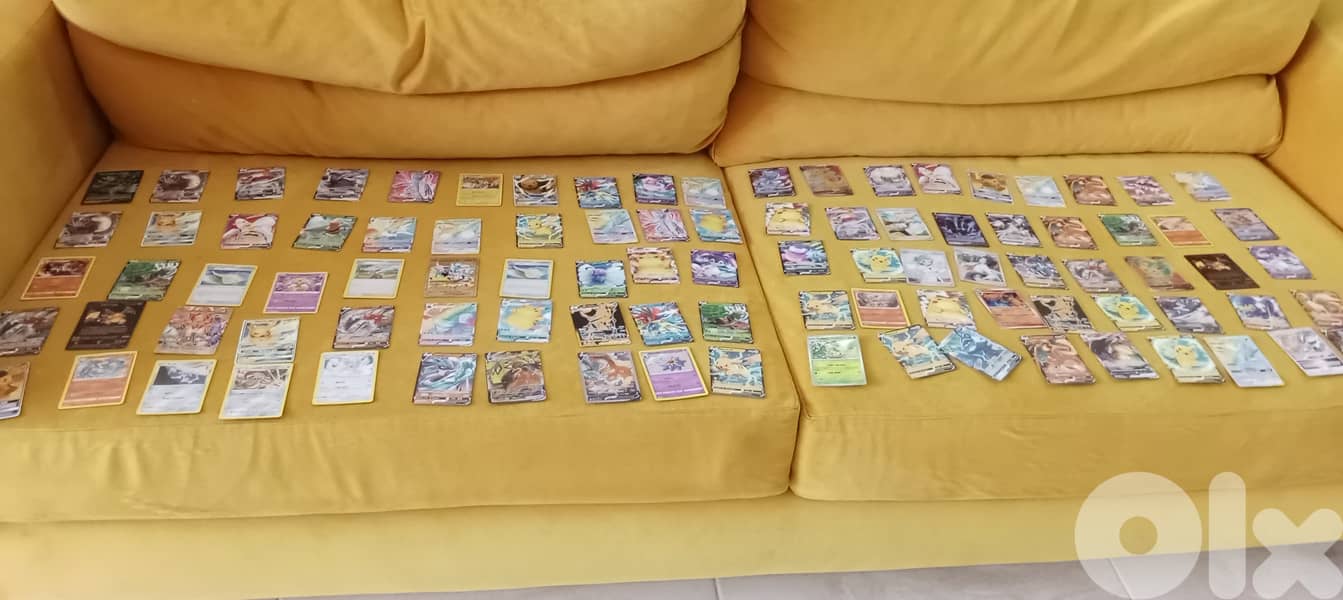 Pokemon 105 real cards, including, 7 Pikachu, 3 Charizard 1