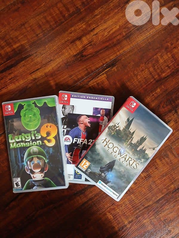 Nintendo switch oled with 3 video games plus all accessories 1
