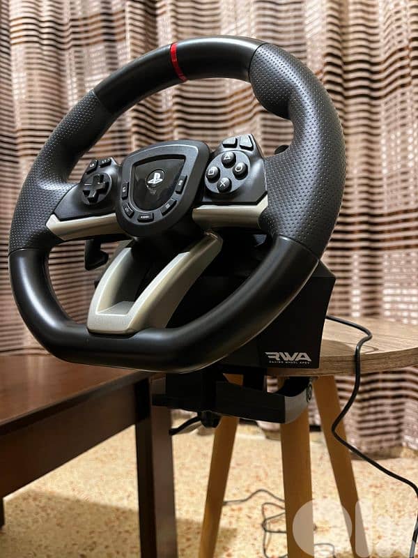 play station and steering wheel 1