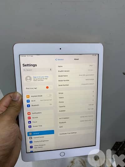 ipad 6 128GB silver ma3o cover aswad ktir ndif w kl chi ch8al