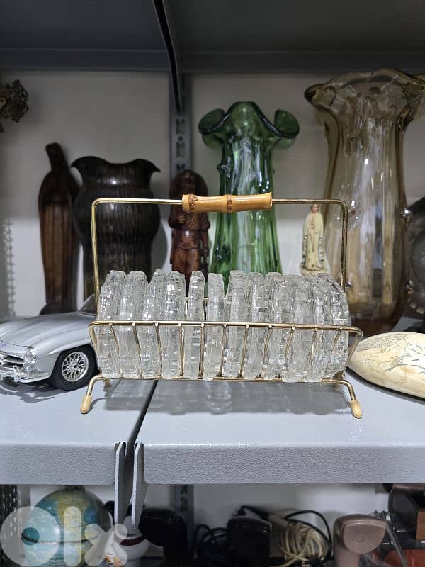 vintage crystal coasters in a brass rack 2