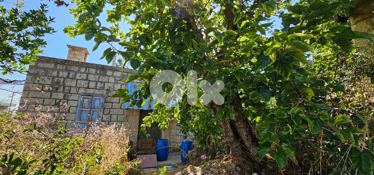 Land with a Townhouse for Sale in Kfardebian 1