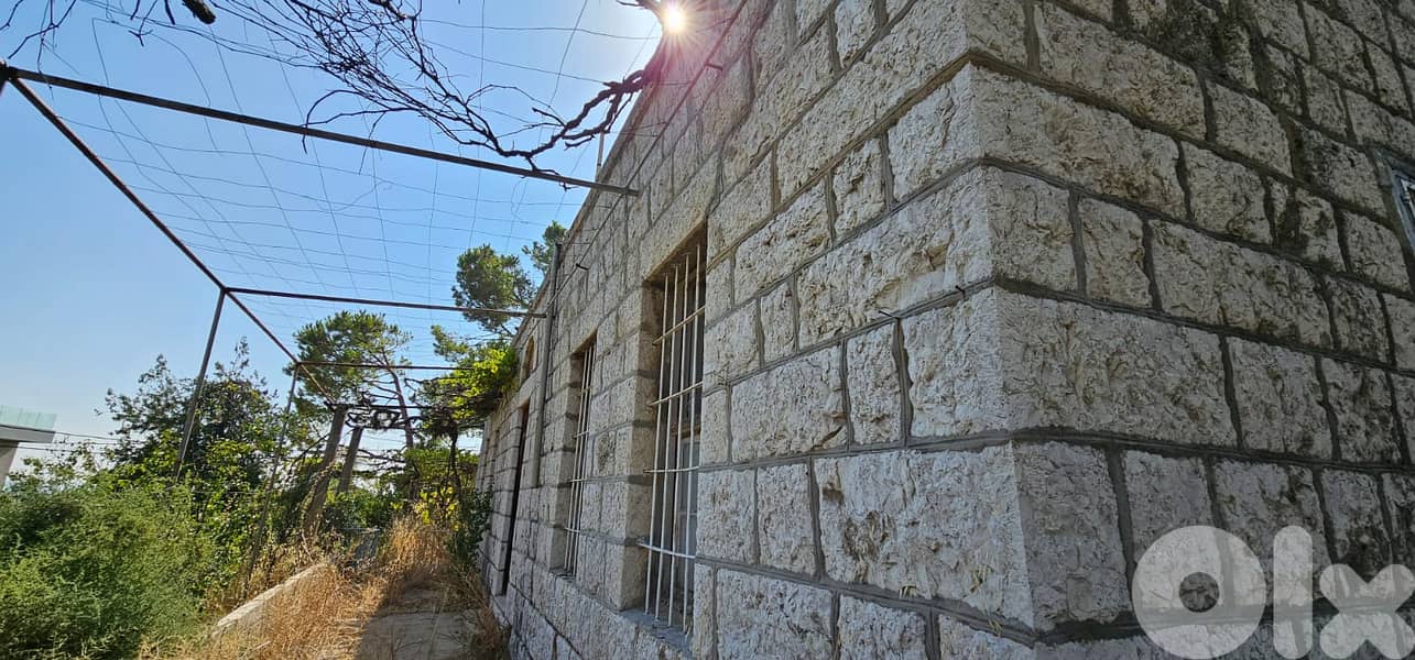 Land with a Townhouse for Sale in Kfardebian 9