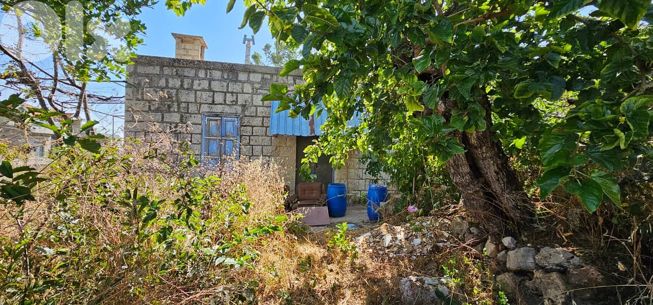 Land with a Townhouse for Sale in Kfardebian 11