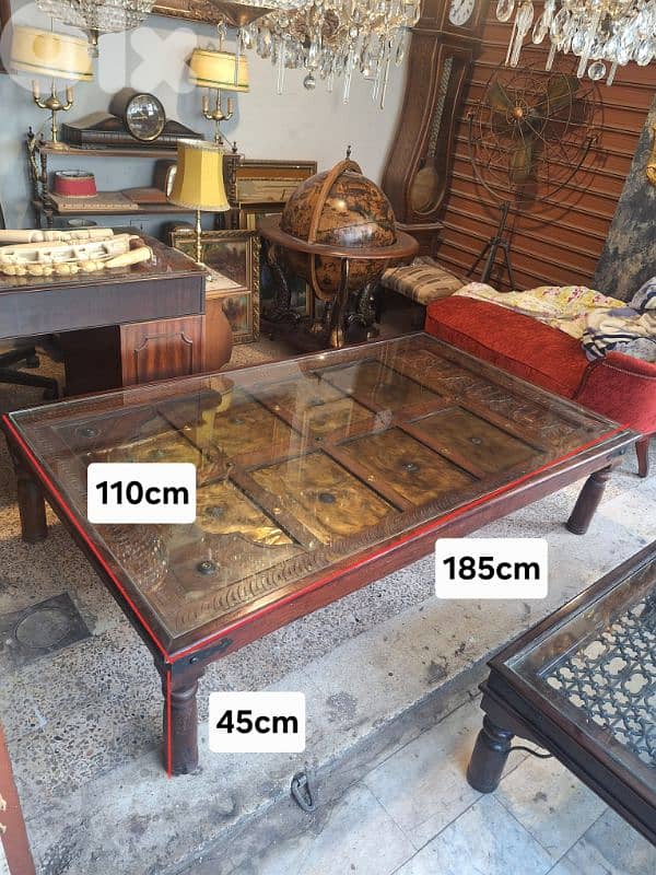 large antique rustic solid wood and bronze door coffee table 1