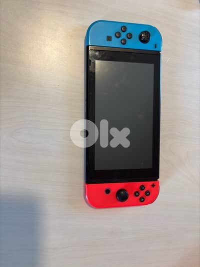 Nintendo Switch + 6 games + Case + accessories