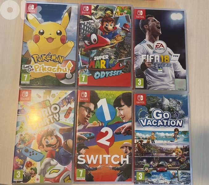 Nintendo Switch + 6 games + Case + accessories 1