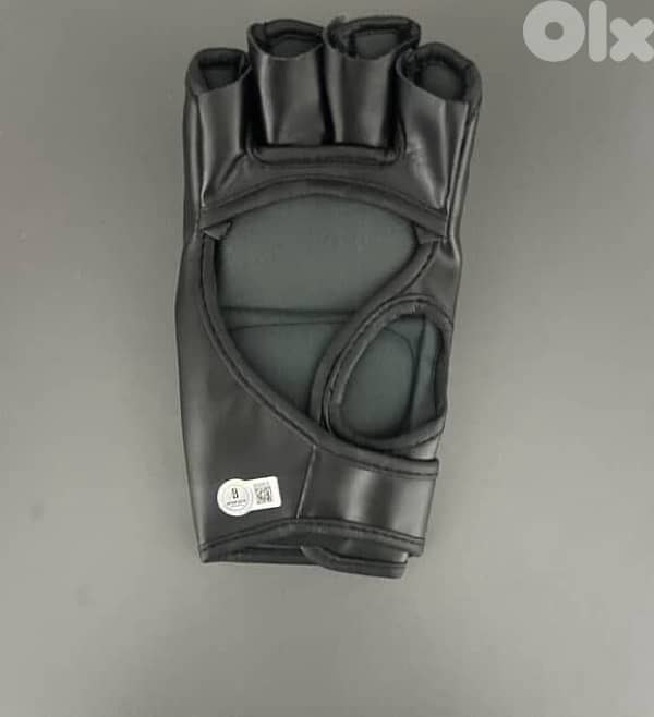 Certified MMA Gloves Signed By Tom Aspinal 1