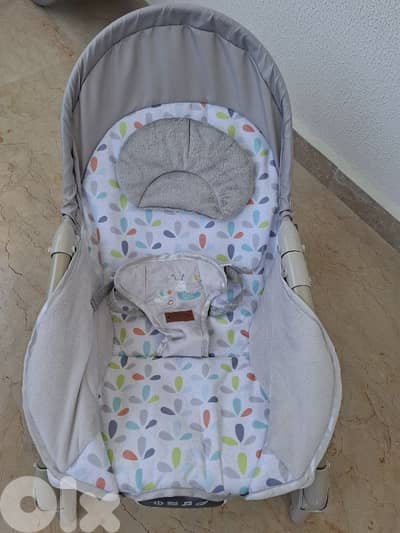 White rocking vibrating chair