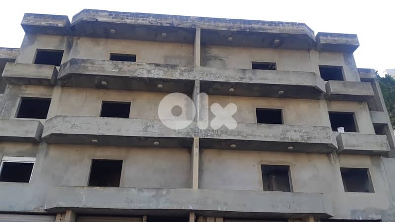 Land with Building for Sale | Halat Road – Qartab 1