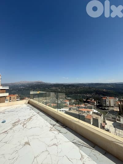 High end rooftop apartment for sale in Baabdat W/ open mountain views