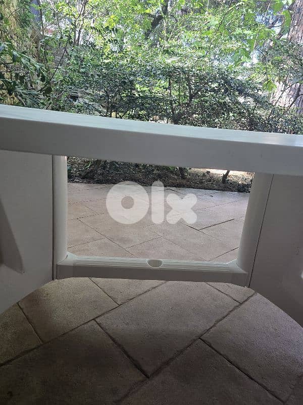 Plastic Table and 14 Chairs 4