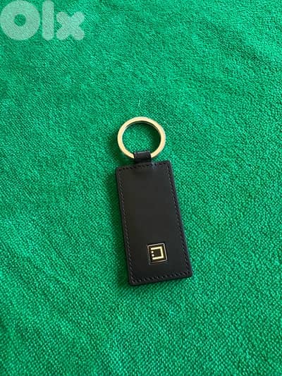 Original S. T. Dupont genuine leather keychain.