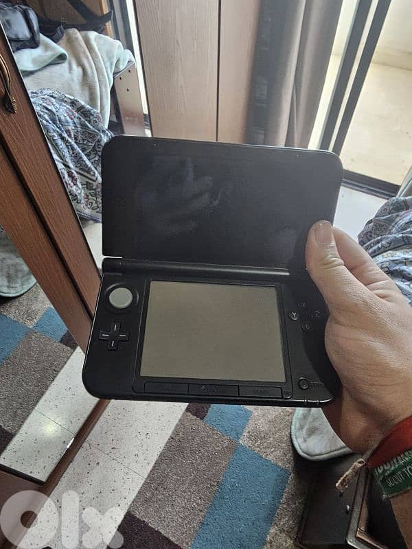 nintendo 3ds xl with games and sd cards 2