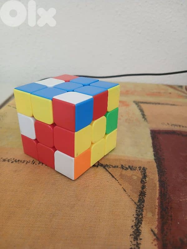 Rubix cube and Spiderman action figure 1