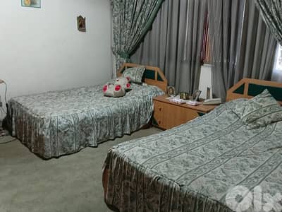 full bedroom (2 single beds, closet, tables)