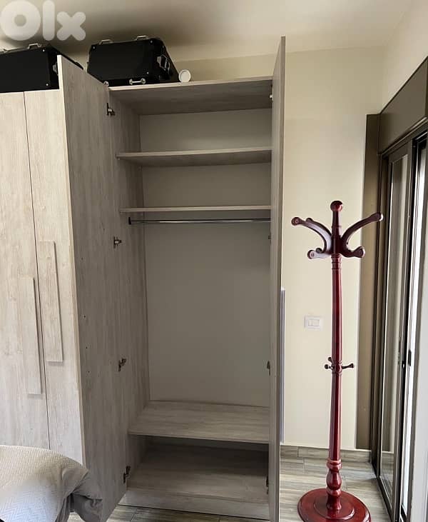 2 closets and 2 study desks 1