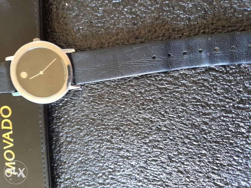 Ladies Movado watch with case 1
