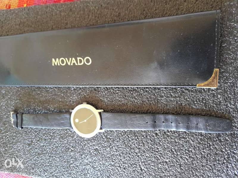 Ladies Movado watch with case 2