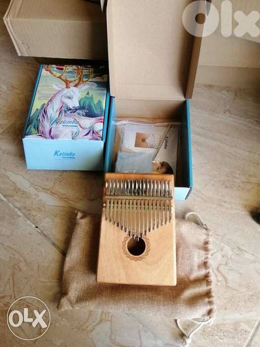 Kalambia من خشب الموهغني مع كامل اغراضها 1