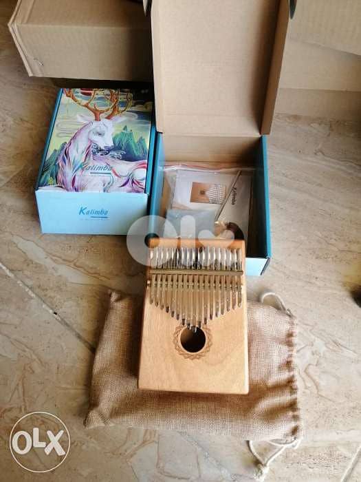 Kalambia من خشب الموهغني مع كامل اغراضها 0