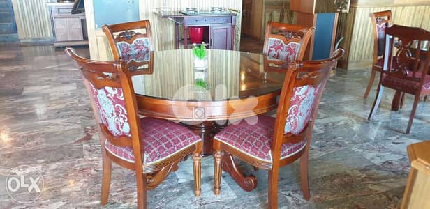 Dining Table with glass top plus 6 chairs, feel brand new!