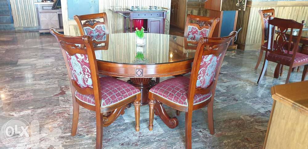 Dining Table with glass top plus 6 chairs, feel brand new! 1