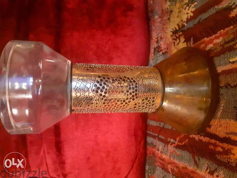 قنينة معطر على شكل ساعة رملية شاهد جميع الصور 0