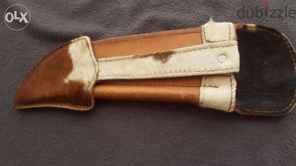 Butcher's knife with a sharpener 4