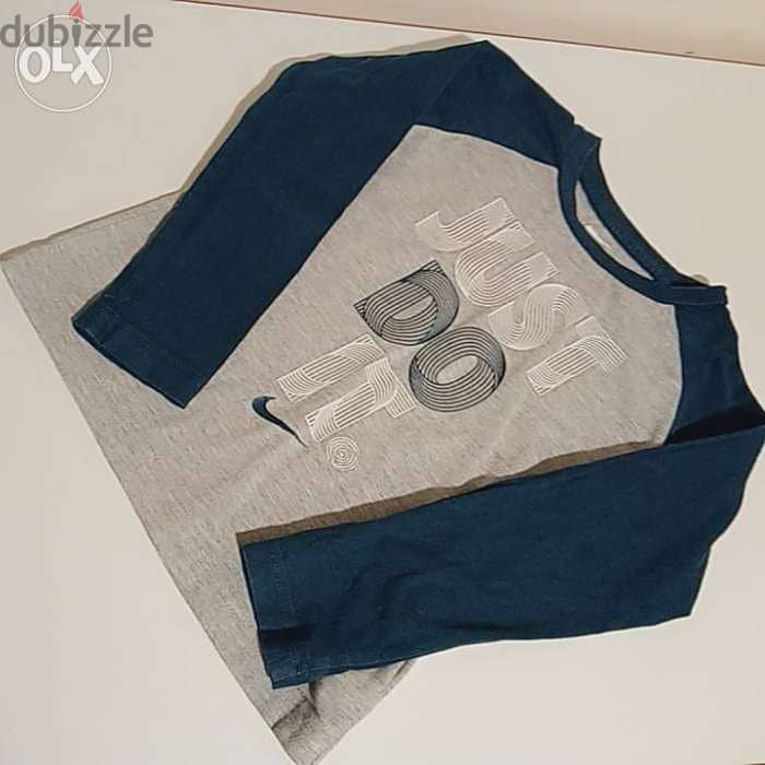 The NIKE tee - 5years - market rate -in excellent condition 1