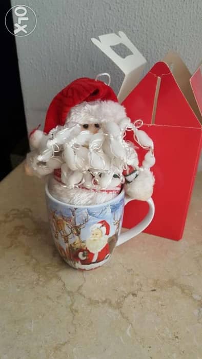 Christmas gift santa claus in a cup 0