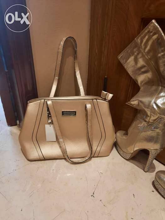 بوطين مع جزدان نمره ٣٧ والجزدان جديد السعر  ٢٥ دولار 1