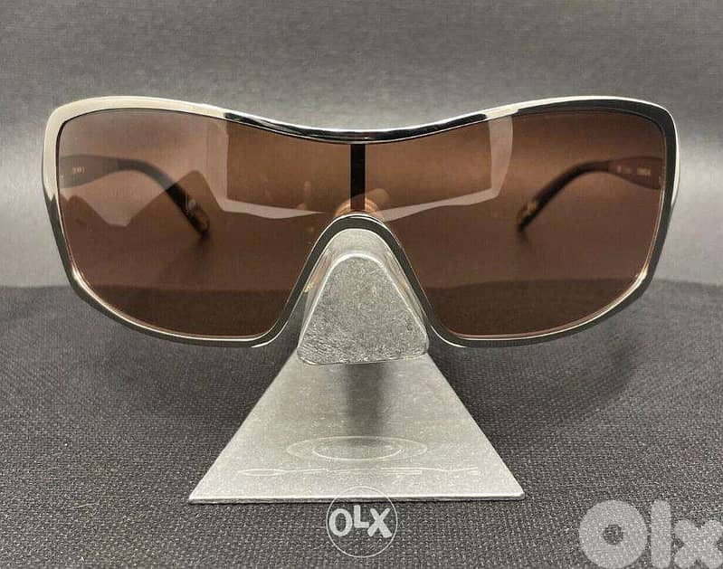 oakley Remedy sunglasses golden frame bronze glass in very good cond 0
