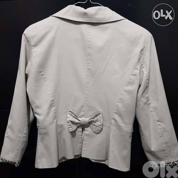 Female beige jacket size 38 1