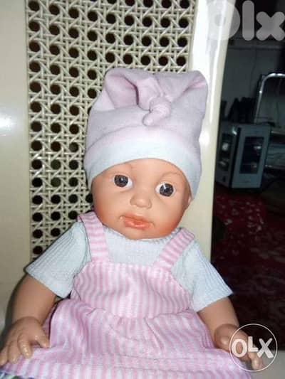 BABY GIRL makes VOICES MEDIUM toy 30 Cm Lebanon made has a disc=14$