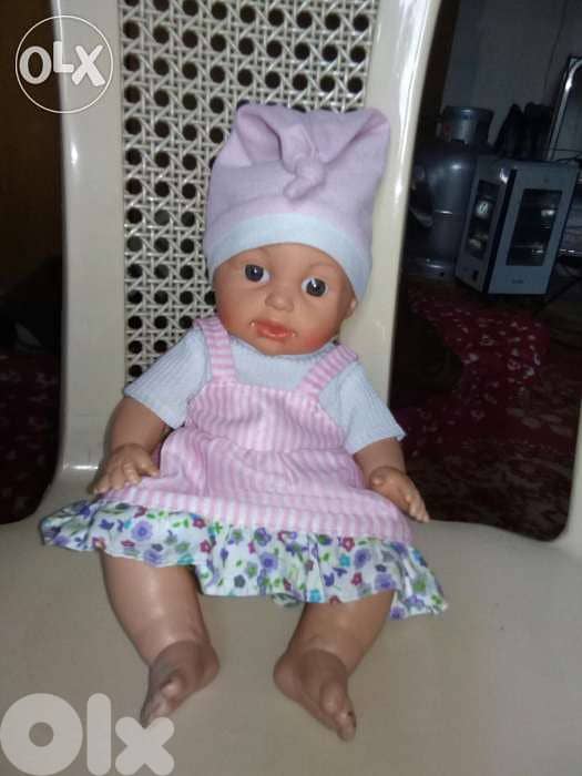 BABY GIRL makes VOICES MEDIUM toy 30 Cm Lebanon made has a disc=14$ 0