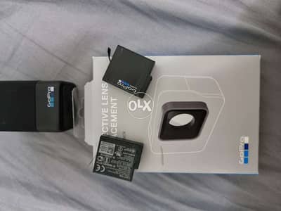 Go Pro Battery and Recharger Dock and lens replacement