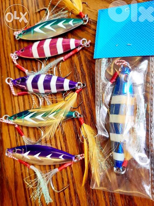 4 sale or trade on jig rod or reel glow jigs 80 gram 0