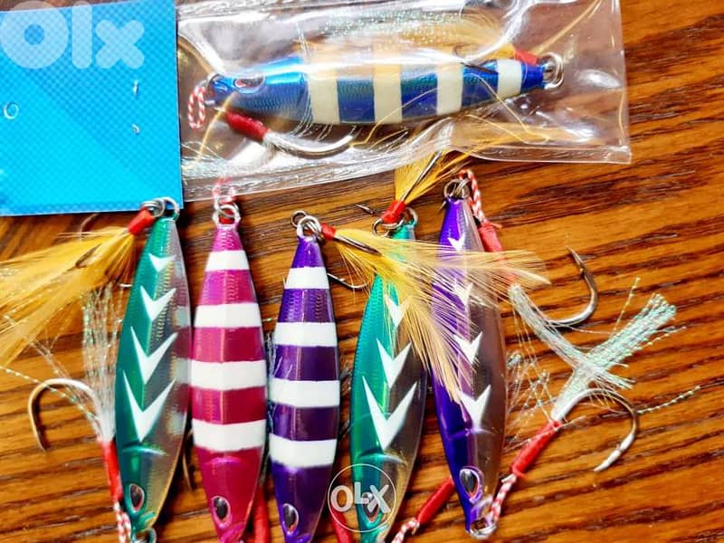 4 sale or trade on jig rod or reel glow jigs 80 gram 1