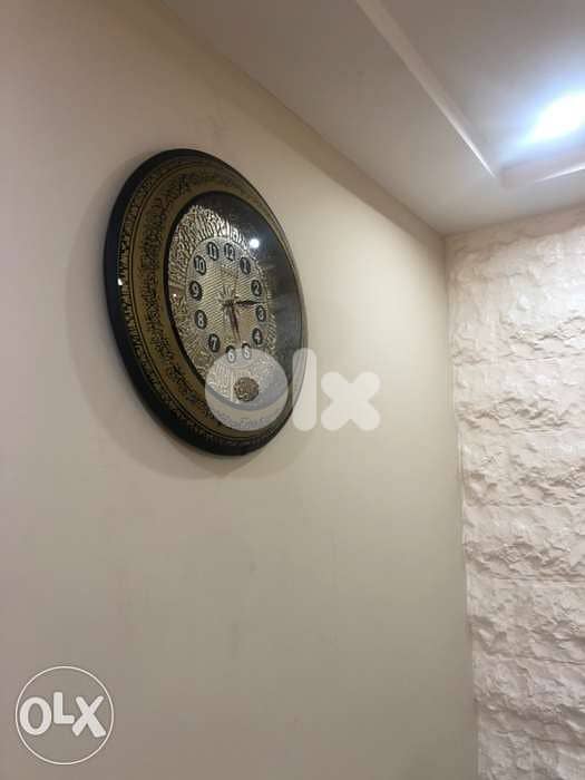 للبيع ساعات حائط 1