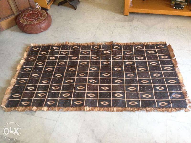 leather carpet with pouff 3